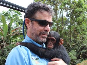 Richard Ruggiero with a 6-month old chimp confiscated from poachers who were trying to sell the chimp on a road in Gabon. Richard Ruggiero with a 6-month old chimp confiscated from poachers who were trying to sell the chimp on a road in Gabon.