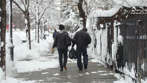 A couple makes their way through the snow in Prospect Heights, Brooklyn on January 27. A couple makes their way through the snow in Prospect Heights, Brooklyn on January 27.