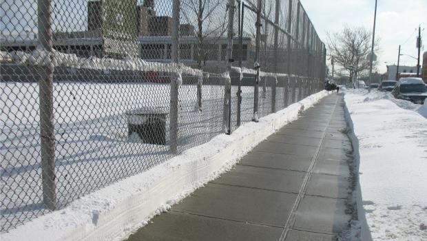 A neatly cleared sidewalk in Red Hook, Brooklyn. A neatly cleared sidewalk in Red Hook, Brooklyn.