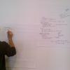 Arnaud Sahuguet at the hackathon ideas board