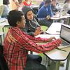 Freshmen students work in a data functions class at the Academy for Software Engineering.