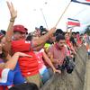 Costa Rican President Luis Guillermo Solis celebrates in San Jose on June 29, 2014 after his team defeated Greece in the Brazil 2014 FIFA World Cup Round of 16