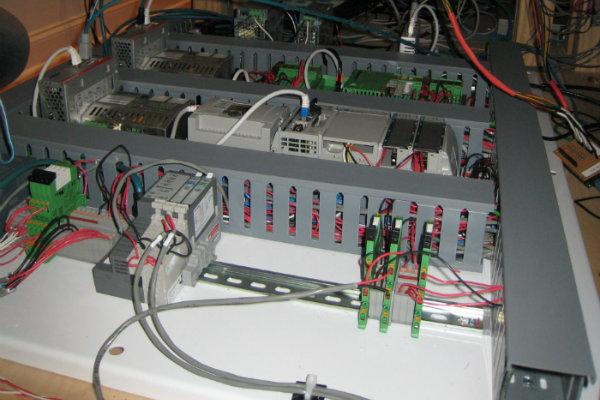 The power plant may be a plastic simulation, but the computer system that runs it underneath the model has to be realistically high tech.