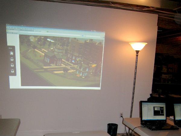 Technicians monitor Cyber City through web cams. They can also use those laptops to make mayhem happen.