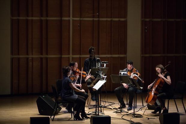 Saul Williams and Mivos Quartet perform at the Ecstatic Music Festival on February 26th, 2014