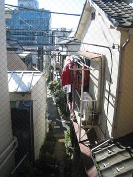 The view of the neighborhood outside Atelier Bow Wow's offices reveals how different eras of architecture exist side by side in contemporary Tokyo.