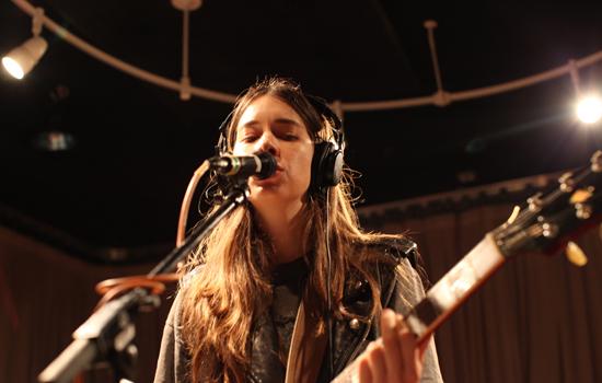 Middle sister Danielle Haim on lead guitar.