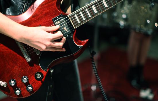 Danielle Haim rocks a Gibson SG, made famous by one of her guitar idols, AC/DC’s Angus Young.