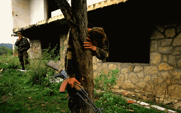 Senad Medanovic, sole survivor of a massacre, finds his home in ruins after the Bosnian army recaptured his village from Serb forces. 1995