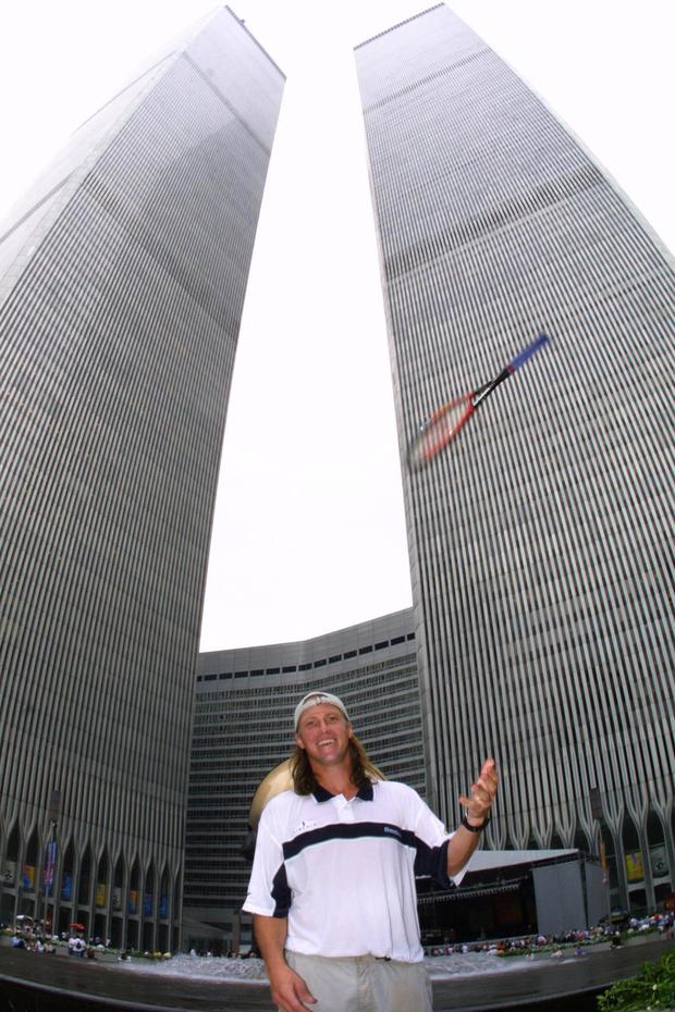 Luke Jensen tosses a racquet skyward in front of the World Trade Center two weeks before 9/11.