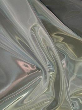 A detail of fabric made from metal and plastic.