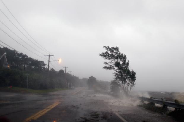 Waves crash onto a road as Hurricane Irene arrives on August 28, 2011 in Southampton, New York. Waves crash onto a road as Hurricane Irene arrives on August 28, 2011 in Southampton, New York.