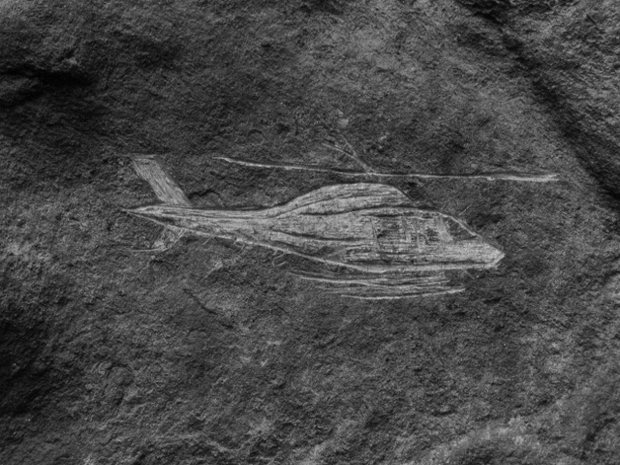 On a rock in the vicinity of New York City, Sudeith has carved an image of an NYPD helicopter. Aircraft, he says, are an omnipresent part of our physical environment.