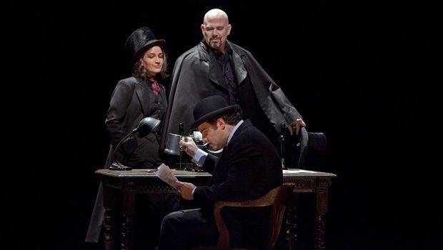 A scene from Act II (Antonia act) of Offenbach’s “Les Contes d’Hoffmann” with Joseph Calleja as Hoffmann (seated), Kate Lindsey as Nicklausse, and Alan Held as Dr. Miracle. A scene from Act II (Antonia act) of Offenbach’s “Les Contes d’Hoffmann” with Joseph Calleja as Hoffmann (seated), Kate Lindsey as Nicklausse, and Alan Held as Dr. Miracle.