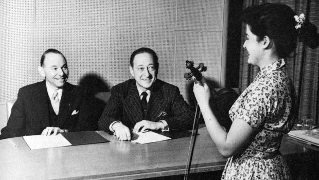 Many of classical music’s biggest stars came to the WQXR studios throughout the 1940s and '50s, including Jascha Heifetz (right), seen here sitting next to WQXR music director Abram Chasins. Many of classical music’s biggest stars came to the WQXR studios throughout the 1940s and '50s, including Jascha Heifetz (right), seen here sitting next to WQXR music director Abram Chasins.
