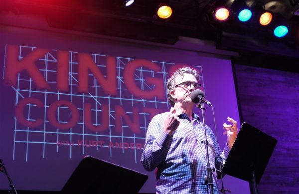 Host Kurt Andersen welcomes the audience before the start of the show.