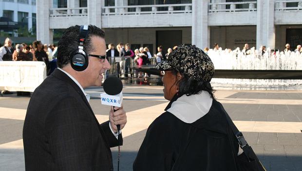 Elliott Forrest speaks with Kathy, a Philharmonic patron (and number two in line!)