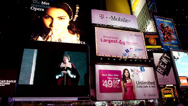 Audiences watch the opening night of the Met Opera in Times Square.