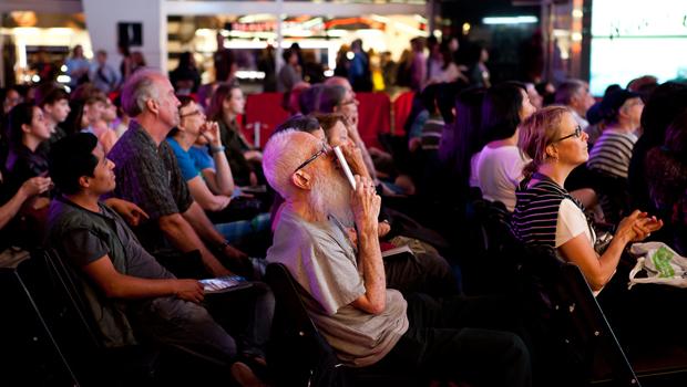 Audiences watch the opening night of the Met Opera in Times Square.