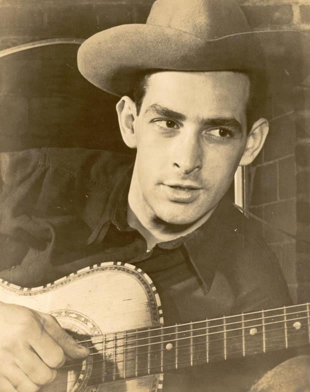 Oscar Brand with his guitar Oscar Brand with his guitar