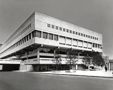 The original façade of the Julliard School was set back from the street by a large expanse of pavement (filling the triangle created by Broadway).