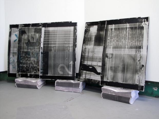 Soloway Gallery in Brooklyn is showing works by 2-UP, a group known for doing collaborative posters with other artists. Shown here: a view of the poster printing plates.