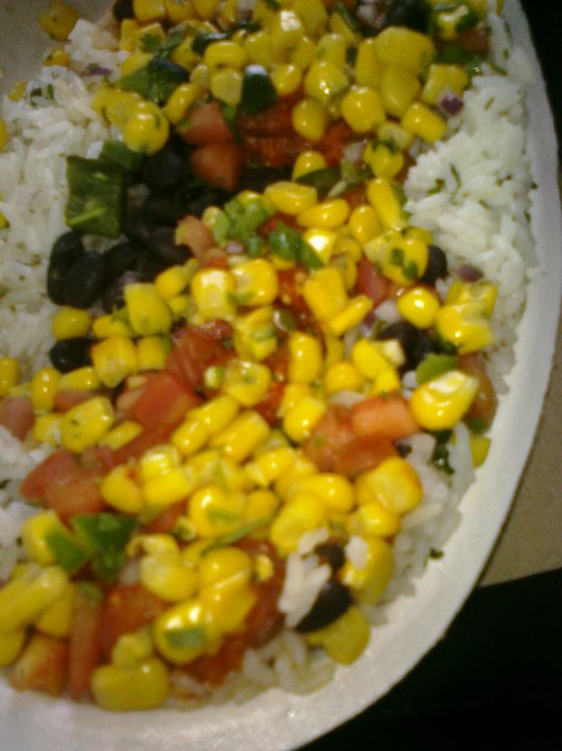Lunch: Chipotle vegetarian rice bowl, including rice, black beans, corn and a side of guacamole