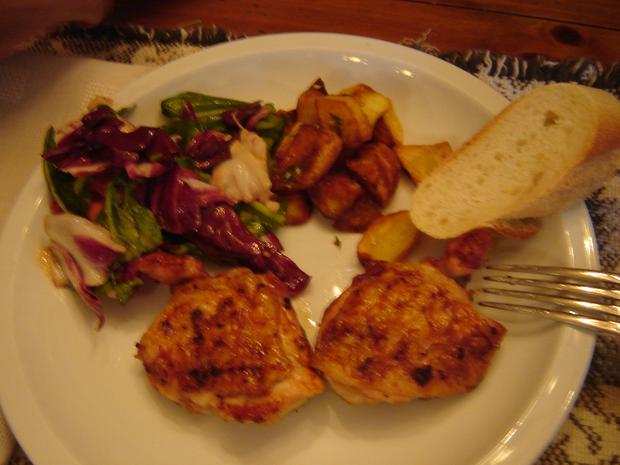 Dinner: barbecued chicken thighs, sautéed potatoes, arugula; radicchio and tomato salad