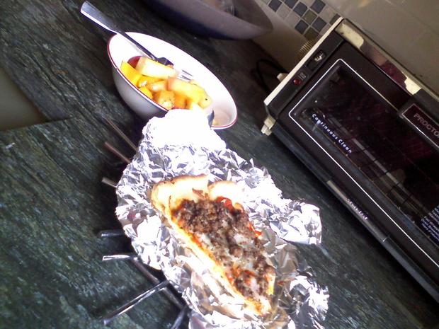 Lunch: homemade gluten-free pizza with red pepper sauce, mozzarella cheese and ground beef; fruit salad