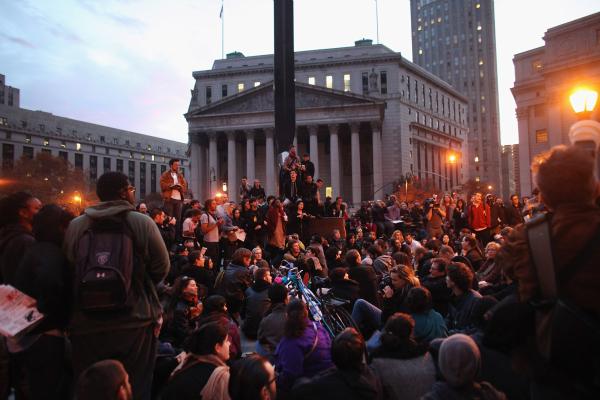 Protesters regroup in Foley Square after police in riot gear removed them from Zuccotti Park early on November 15.