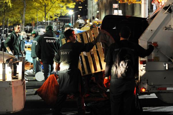 New York City sanitation workers clear the 'Occupy Wall Street' protest from Zuccotti Park in the early morning hours of November 15.