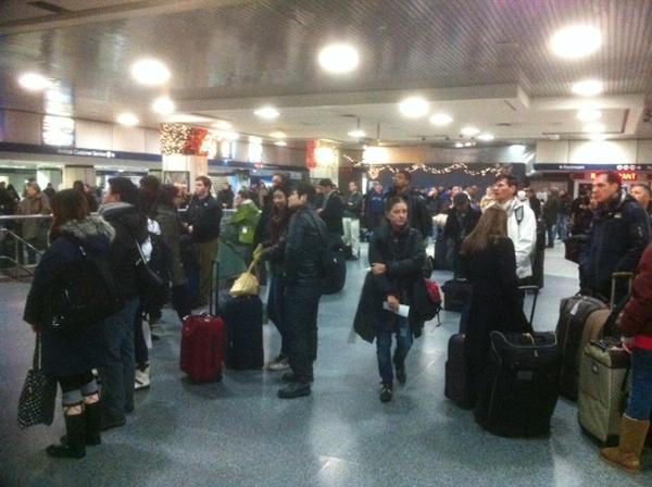 Amtrak Passengers Stare at a Board Full of Delays and Cancellations at Penn Stations Amtrak Passengers Stare at a Board Full of Delays and Cancellations at Penn Station