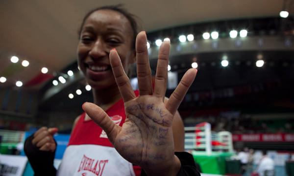Raquel Miller who has boxed for only two years is the rookie of the team. She writes bible verses on her hands before competition.