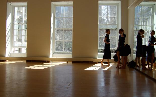 Dance New Amsterdam's bright, sunny space featuring floor to ceiling windows.