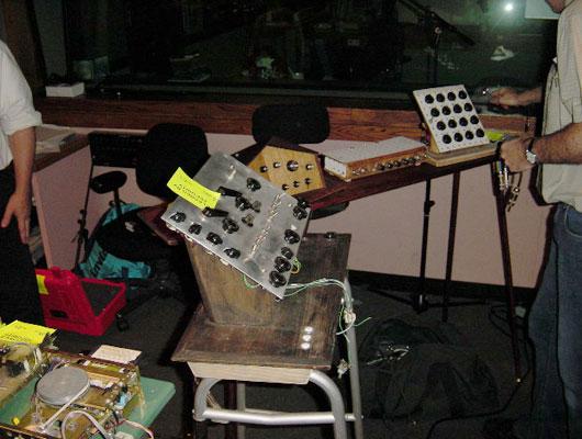 An array of Dewanatron inventions. Old folks' aluminum walkers serve as stands for most of the instruments.