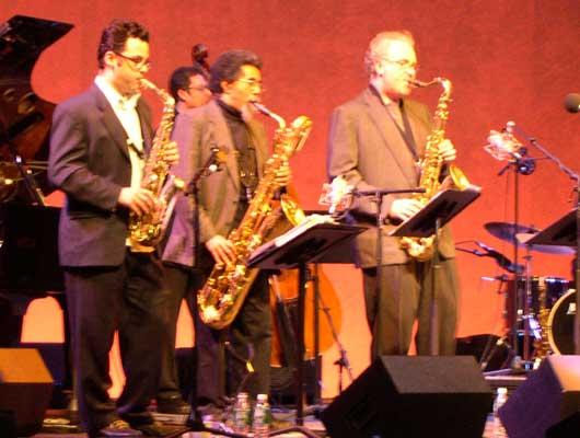 Members of E/O Jeremy Udden, alto sax; Kurtis Rivers, baritone sax; Russ Gerson, founder of the E/O and tenor sax; (back row) Rick McLaughlin, bass, 11/12/04.