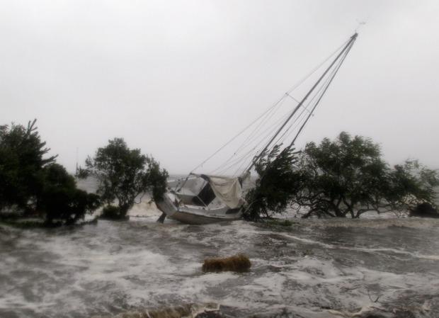 A sailboat is washed ashore as Hurricane Irene arrives on August 28, 2011 in Southampton, New York. A sailboat is washed ashore as Hurricane Irene arrives on August 28, 2011 in Southampton, New York.