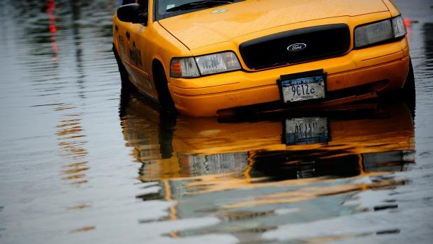 A taxi sits in flood water on Coney Island after Hurricane Irene hit on Sunday. A taxi sits in flood water on Coney Island after Hurricane Irene hit on Sunday.