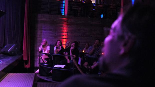 The audience watches Kurt Braunohler's stand-up set.