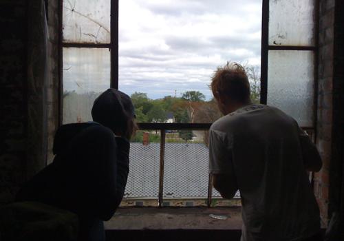 The two artists call the building World Headquarters, because as Andresky says, “We are all interested in world domination through the arts.” Detroit ruin architecture, homesteading, looking out