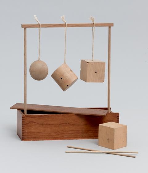 Froebel Gift No. 2: Sphere, Cylinder, and Cube. c. 1890.