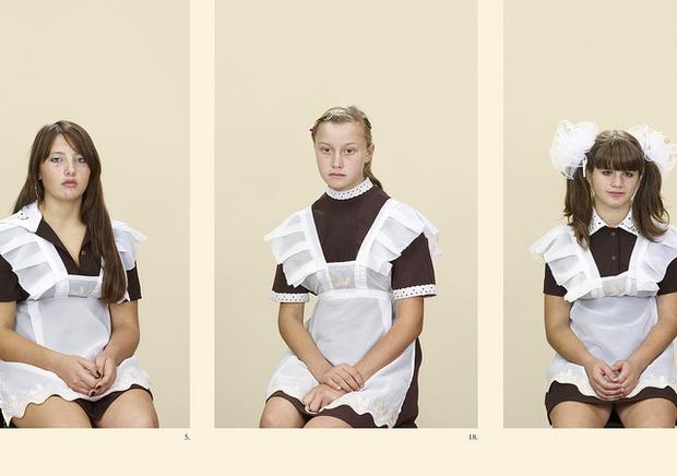 MoMA is displaying part of an intense photographic series by Taryn Simon -- pieces that examine individuals tied to a specific bloodline. Seen here: students from the Ukraine.