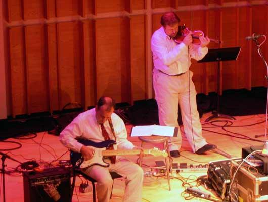 Composer Phil Kline and violinist Todd Reynolds perform Zippo Songs, 9/28/04.