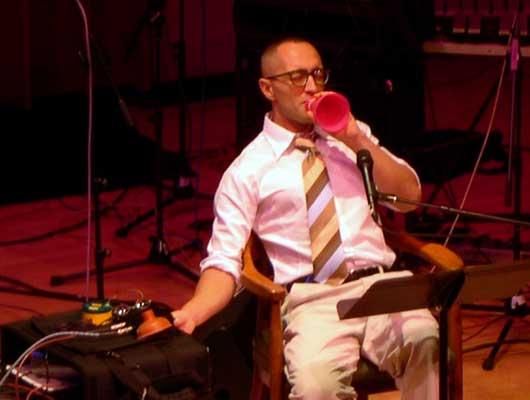 Theo Bleckman with a mini-megaphone doing more vocal improvisations, 9/28/04.