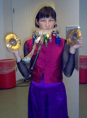Soloist Margaret Leng Tan, resplendent in purple and magenta, 12/9/03.