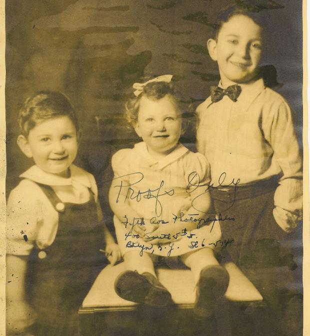 Leonard (right) with his brother and sister. Leonard (right) with his brother and sister.