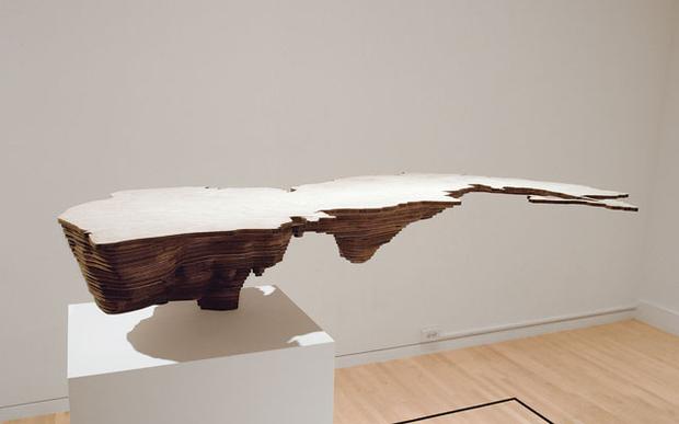 From The Map as Art: Lin's sculptures look like upside down mountains or
islands but in reality they are bodies of water, surrounded by land. From The Map as Art: Lin's sculptures look like upside down mountains or
islands but in reality they are bodies of water, surrounded by land.