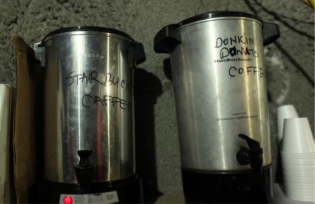 One worker says Dunkin Donuts coffee is more popular with the workers. One worker says Dunkin Donuts coffee is more popular with the workers.