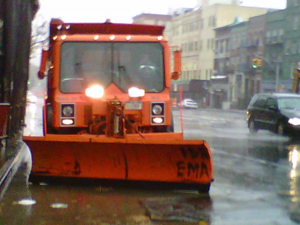 Snow plow in position on the corner of E. Houston and Ave A in Manhattan. Snow plow in position on the corner of E. Houston and Ave A in Manhattan.