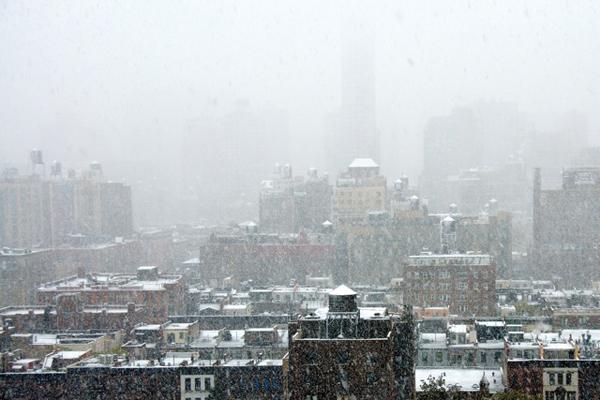 Looking across the building tops in the snow on Saturday from 79th Street in Manhattan. Looking across the building tops in the snow on Saturday from 79th Street in Manhattan.